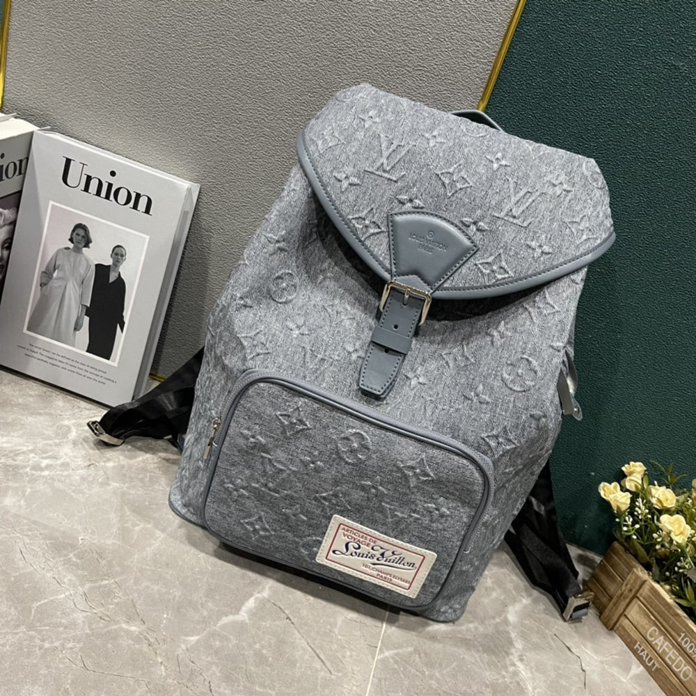 L Grey embossed Backpack or Duffle