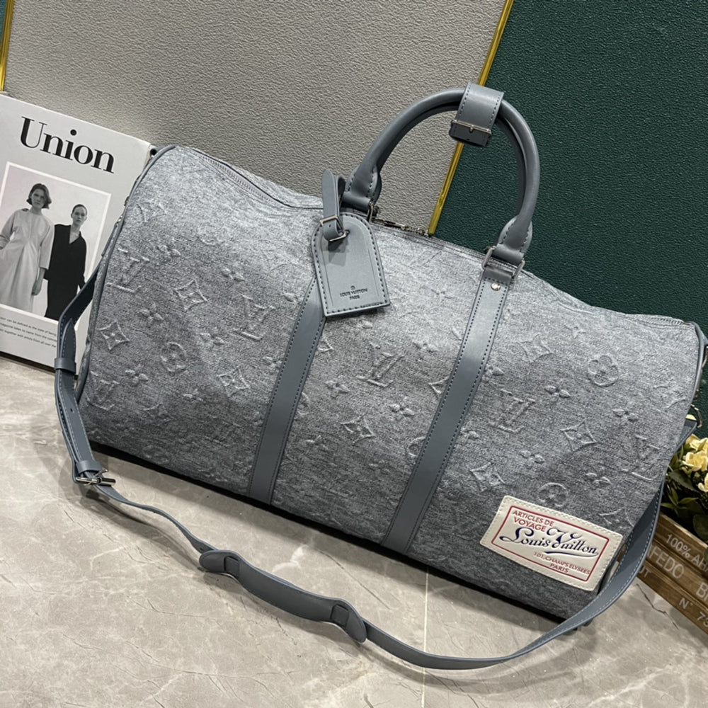 L Grey embossed Backpack or Duffle