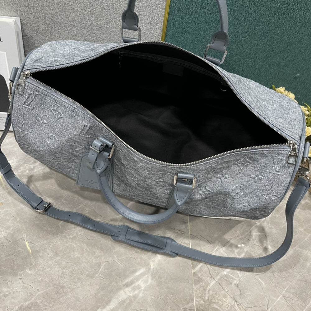 L Grey embossed Backpack or Duffle