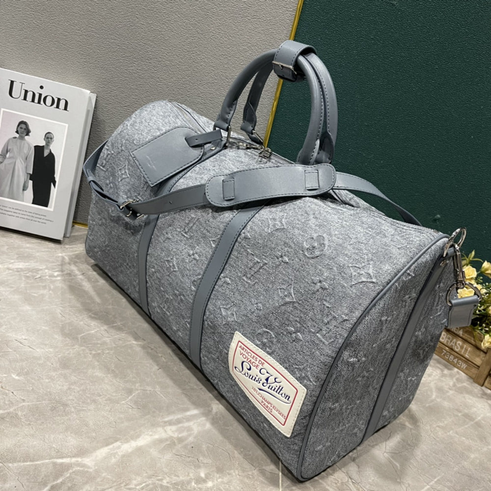 L Grey embossed Backpack or Duffle