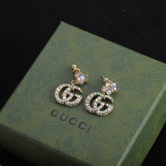 G earrings