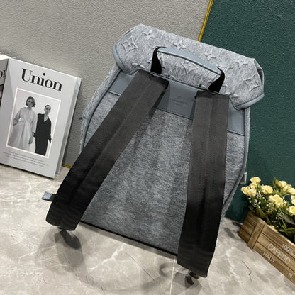 L Grey embossed Backpack or Duffle