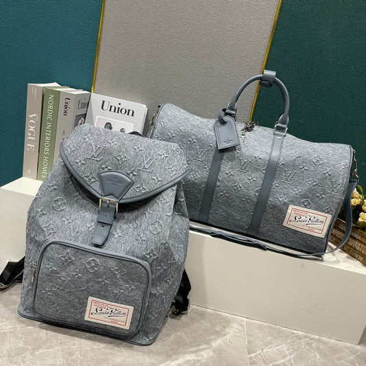 L Grey embossed Backpack or Duffle