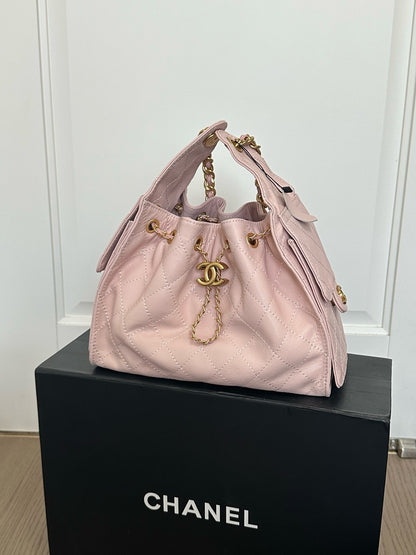 Blush Pink Quilted Drawstring Bucket Shoulder Bag with Gold Chain Accents